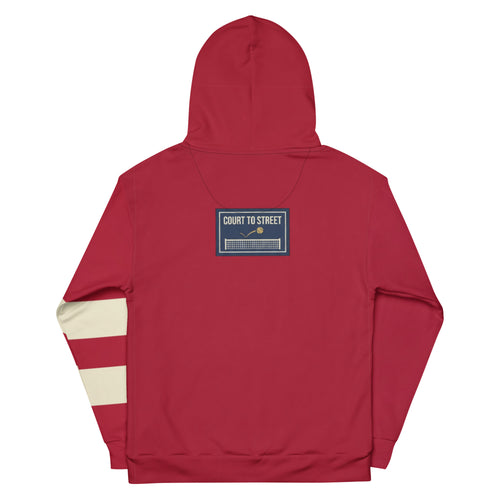 Back of Pangkaroo Club cherry red hoodie with navy Court to Street net graphic and cream left-sleeve stripes.”